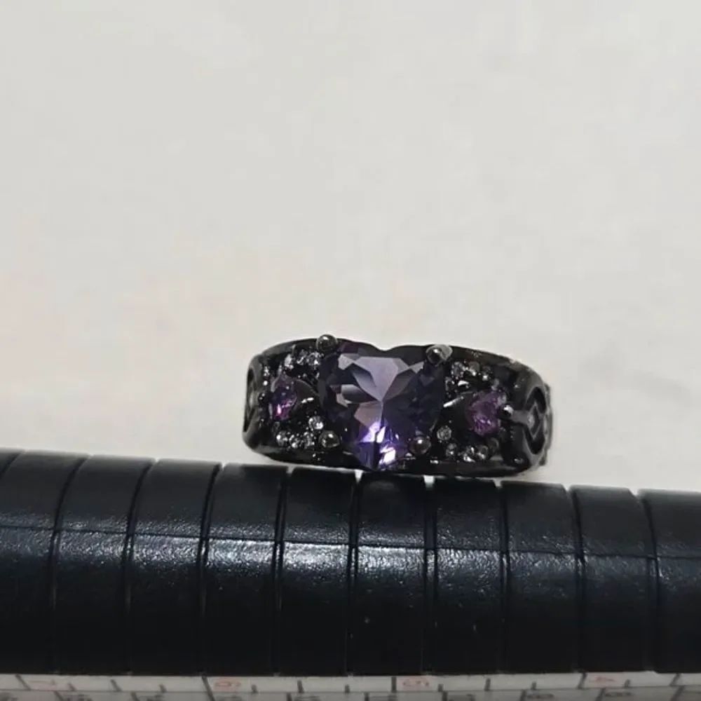 Sterling Silver Ring With Purple Crystals